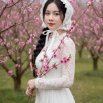 Cô gái Việt giữa vườn đào nở rộ trong hình ảnh chân dung siêu thực 8K đầy mê hoặc