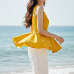 Chân dung thanh lịch của cô gái trẻ bên bờ biển với trang phục và phong cách ấn tượng